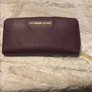 Plum purple Michael kors wallet.